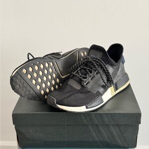 Adidas NMD_R1.V2 black and gold sneakers